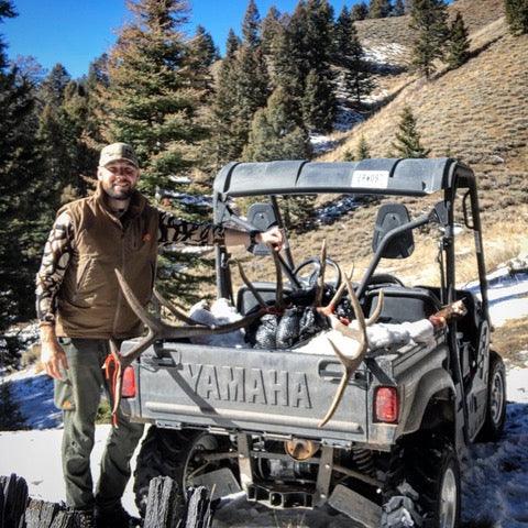 The author Nate Fowler with his bull elk harvested on a solo hunt.