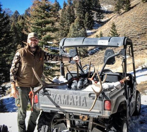 The author Nate Fowler with his bull elk harvested on a solo hunt.